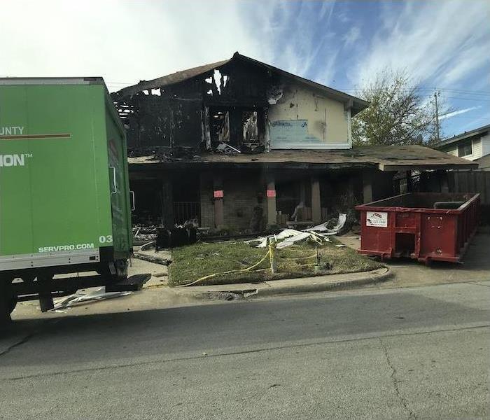 home with fire damaged roof