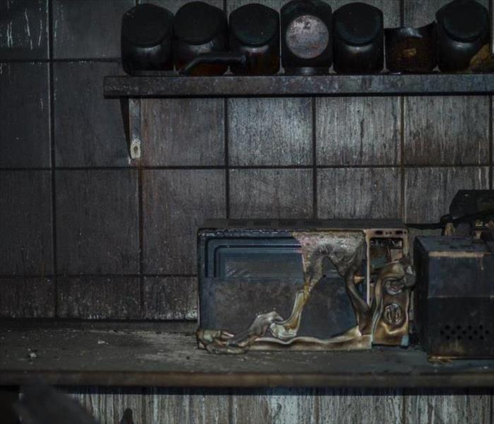 fire damaged kitchen counter and toaster