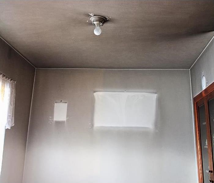 smoke and soot damage on wall