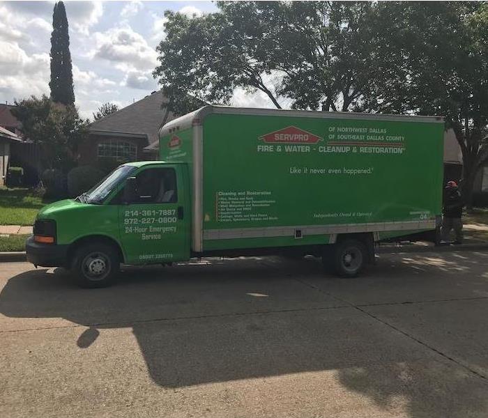 SERVPRO vehicle parked in front of home